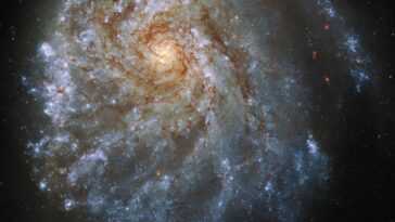 The Hubble Space Telescope takes a closer look at an unusual spiral galaxy 120 million light-years away
