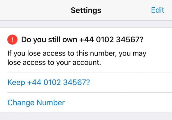 capture d'écran du message demandant un changement de numéro de contact iOS dans Telegram