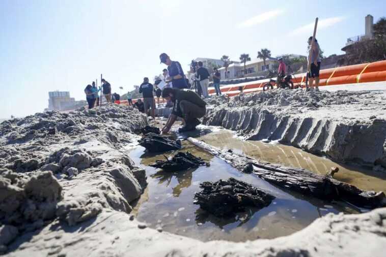 "Voici ce qui est caché dans le sable": résolu le mystère de l'objet refait surface en Floride 1 "voici Ce Qui Est Caché Dans Le Sable": Résolu Le