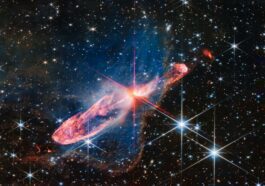 Riddle me this: What is the deep-space question mark astronomers found in this Webb NIRCam photo?