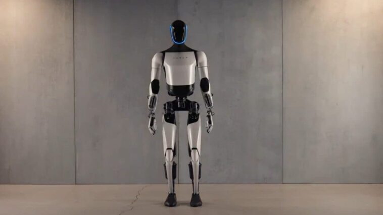 Dans les usines de Tesla, il y a deux robots qui travaillent de manière autonome : que font-ils 1 Image