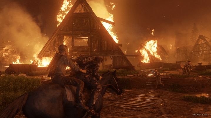 Une maison en feu dans The Last of Us Part 2 Remastered.