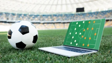 Soccer Ball And Laptop With Formation On Screen On 2023 11 27 05 17 27 Utc