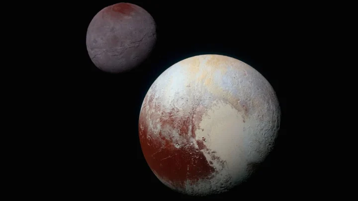 La formation de Pluton et de Charon : un phénomène fascinant de "baiser et capture" 2 Illustration de Pluton et de sa lune Charon