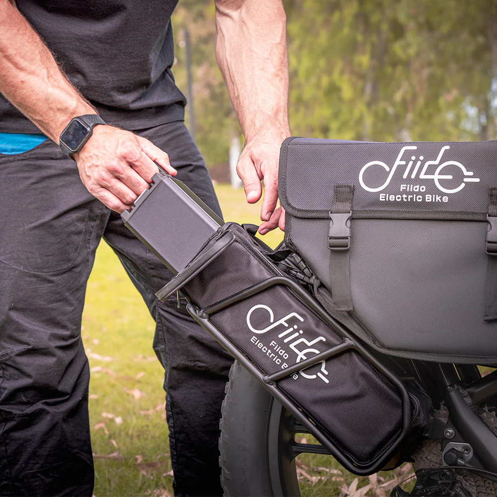 Fiido Titan 2025 : Le vélo électrique touring encore meilleur, au même prix 3 Fiido Titan 2025 Batterie Enleve